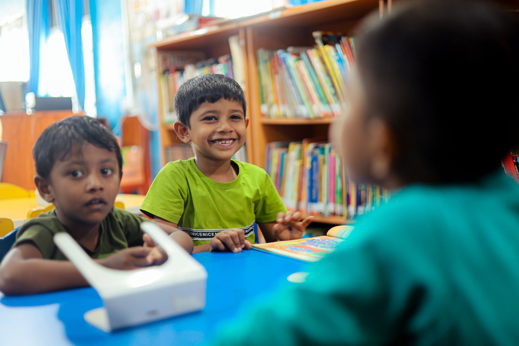 Children learning together in class